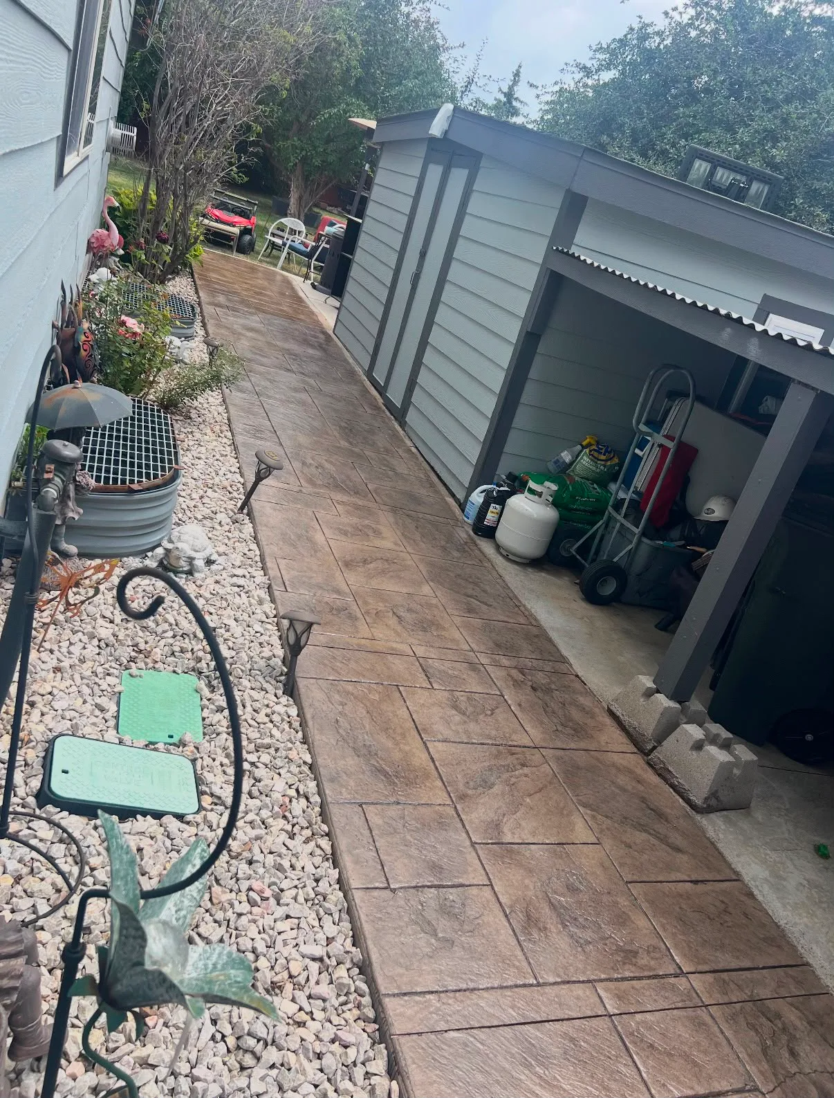 Stamped concrete walkway landscaping in Colorado